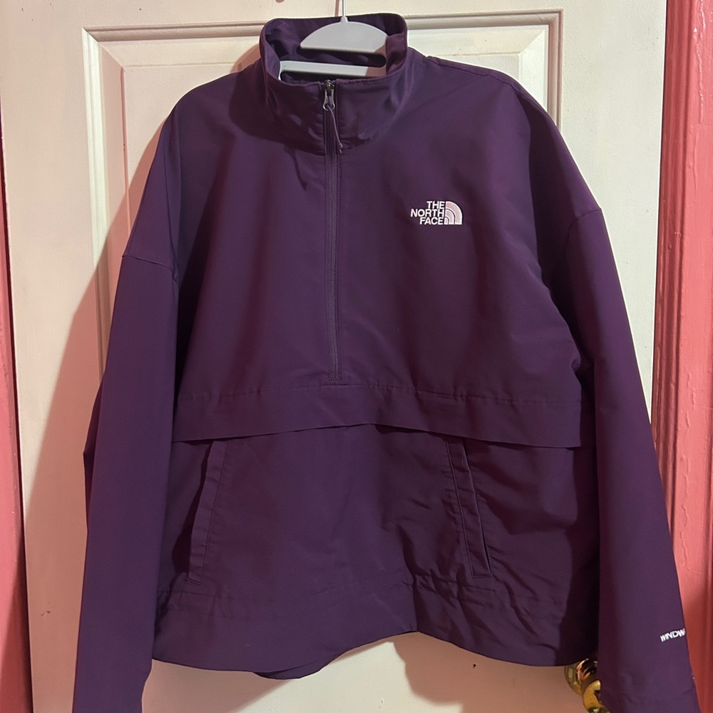 The North Face Purple Ski Jacket with High Collar and Pullover Design